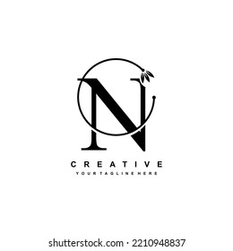 black letter N logo template with floral ornaments and circular lines. elegant and luxurious letter N logo design. beautiful letter N logo vector. N icon