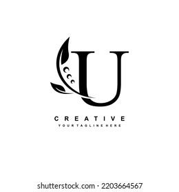 logotipo de letra negra en U con adorno lujoso de hoja negra. U florece, monograma U, tipografía. logo de plumas. Diseño premium U. adecuado para el logotipo de la empresa, negocios, boutique, boda, celebración, etc