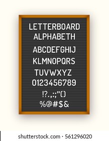 Black letterboard with white plastic letters, numbers, symbols. Hipster vintage alphabeth 80x, 90x