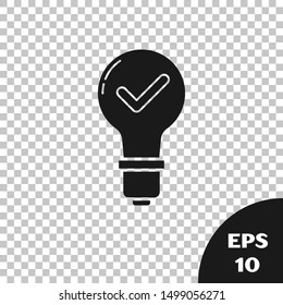 Black Light bulb and check mark icon isolated on transparent background. Concept of idea.  Vector Illustration