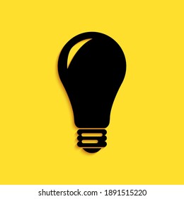 Black Light bulb icon isolated on yellow background. Energy and idea symbol. Lamp electric. Long shadow style. Vector.