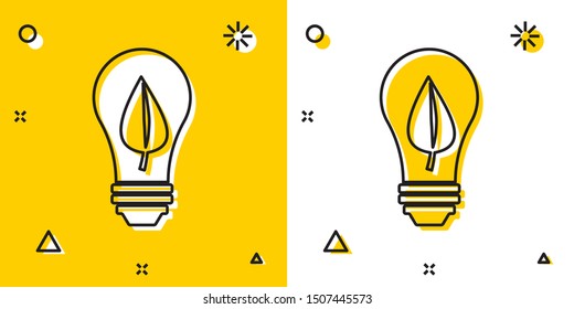 Black Light bulb with leaf icon isolated on yellow and white background. Eco energy concept. Alternative energy concept. Random dynamic shapes. Vector Illustration