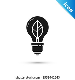 Black Light bulb with leaf icon isolated on white background. Eco energy concept. Alternative energy concept.  Vector Illustration
