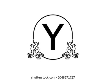 Black line art of bonfire with Y initial letter design