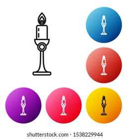 Black line Burning candle in candlestick icon on white background. Old fashioned lit candle. Cylindrical candle stick with burning flame. Set icons colorful circle buttons. Vector Illustration