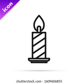 Black line Burning candle in candlestick icon isolated on white background. Cylindrical candle stick with burning flame.  Vector Illustration