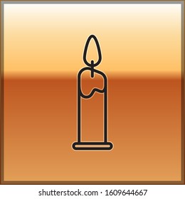 Black line Burning candle in candlestick icon isolated on gold background. Cylindrical candle stick with burning flame.  Vector Illustration