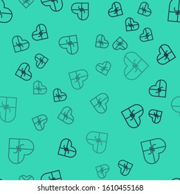 Black line Candy in heart shaped box and bow icon isolated seamless pattern on green background. Valentines Day.  Vector Illustration