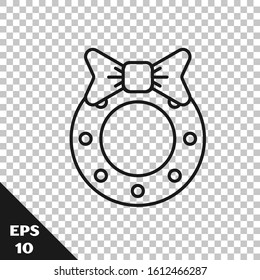 Black line Christmas wreath icon isolated on transparent background. Merry Christmas and Happy New Year.  Vector Illustration