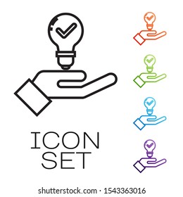 Black line Light bulb in hand icon isolated on white background. Concept of idea. Set icons colorful. Vector Illustration