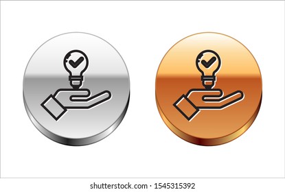 Black line Light bulb in hand icon isolated on white background. Concept of idea. Silver-gold circle button. Vector Illustration