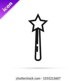 Black line Magic wand icon isolated on white background. Star shape magic accessory. Magical power.  Vector Illustration