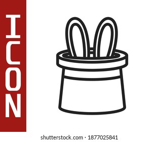 Black line Magician hat and rabbit ears icon isolated on white background. Magic trick. Mystery entertainment concept.  Vector
