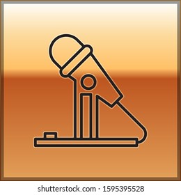 Black line Microphone icon isolated on gold background. On air radio mic microphone. Speaker sign.  Vector Illustration