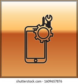 Black line Mobile phone with screwdriver and wrench icon isolated on gold background. Adjusting, service, setting, maintenance, repair.  Vector Illustration