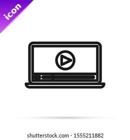 Black line Online play video icon isolated on white background. Laptop and film strip with play sign.  Vector Illustration