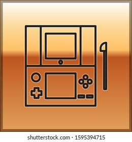 Black line Portable video game console icon isolated on gold background. Gamepad sign. Gaming concept.  Vector Illustration