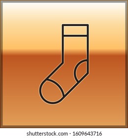 Black line Socks icon isolated on gold background.  Vector Illustration