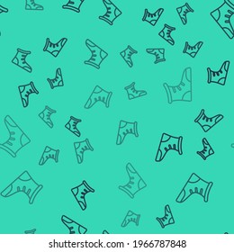 Black line Sport boxing shoes icon isolated seamless pattern on green background. Wrestling shoes.  Vector