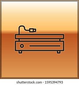 Black line Video game console icon isolated on gold background.  Vector Illustration