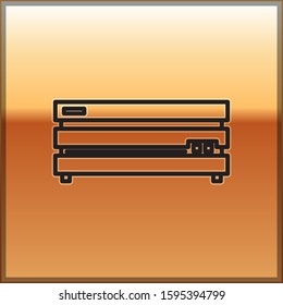 Black line Video game console icon isolated on gold background.  Vector Illustration