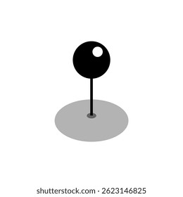 Black location pin icon with shadow highlighting its position on a flat surface