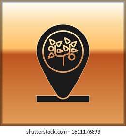 Black Location and tree icon isolated on gold background.  Vector Illustration