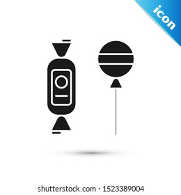 Black Lollipop icon isolated on white background. Candy sign. Food, delicious symbol.  Vector Illustration