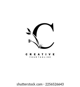 black luxury C logo design with beautiful floral and leaf ornament decoration. initial C letter logo. monogram C typography. feather logo