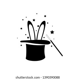 Black magic hat, rabbire ars with wand stick, magical performance, wizard, fairy tale