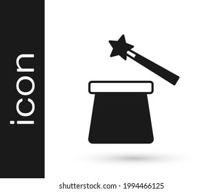 Black Magic hat and wand icon isolated on white background. Magic trick. Mystery entertainment concept.  Vector