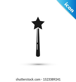Black Magic wand icon isolated on white background. Star shape magic accessory. Magical power.  Vector Illustration