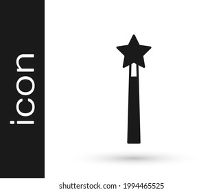 Black Magic wand icon isolated on white background. Star shape magic accessory. Magical power.  Vector
