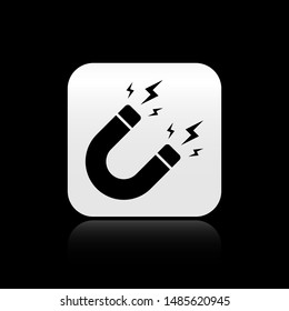 Black Magnet with lightning icon isolated on black background. Horseshoe magnet, magnetism, magnetize, attraction sign. Silver square button. Vector Illustration