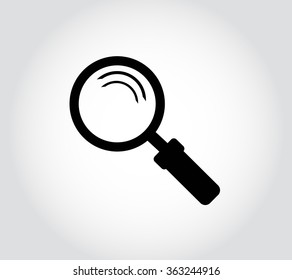 black magnifying glass on a gray background 