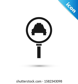 Black Magnifying glass and taxi car icon isolated on white background. Taxi search.  Vector Illustration