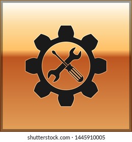 Black Maintenance symbol - wrench and screwdriver in gear icon isolated on gold background. Service tool symbol.  Vector Illustration