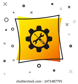 Black Maintenance symbol - wrench and screwdriver in gear icon isolated on white background. Service tool symbol. Yellow square button. Vector Illustration
