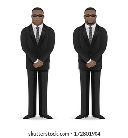 Black man bodyguard stands in closed pose 