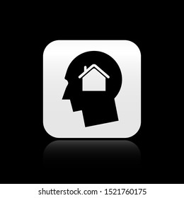 Black Man dreaming about buying a new house icon isolated on black background. Silver square button. Vector Illustration
