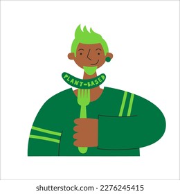 Black man in green holds fork and veggie sausage. Vegan plant-based healthy diet. Sustainable cruelty-free climate-friendly meatless dairy-free food. Animal protein replacement.