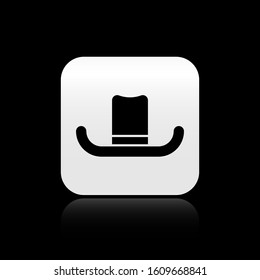 Black Man hat with ribbon icon isolated on black background. Silver square button. Vector Illustration