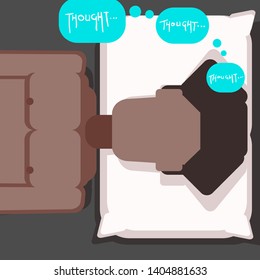 Black man lying in bed on pillow thinking