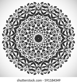 Black mandala round ornament on a white background. Decorative geometric floral pattern, monochrome decoration. Isolated design element. Hand drawn doodle art. Tribal ethnic arabic, indian motif