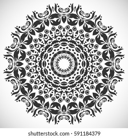 Black mandala round ornament on a white background. Decorative geometric floral pattern, monochrome decoration. Isolated design element. Hand drawn doodle art. Tribal ethnic arabic, indian motif