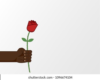 Black man's hand holding beautiful red rose asking out for a date or showing one true love with text space on the right
