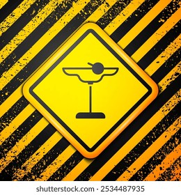 Black Margarita cocktail glass with lime icon isolated on yellow background. Warning sign. Vector