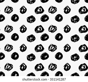 Black marker big scribble dots.Free hand drawn with ink brush seamless background. Abstract texture. Modern irregular tilable design.