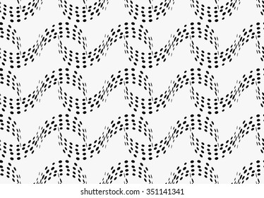 Black marker dotted s curves.Free hand drawn with ink brush seamless background. Abstract texture. Modern irregular tilable design.