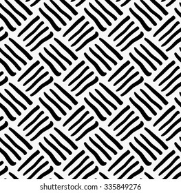 Black marker drawn diagonal stripes.Hand drawn with paint brush seamless background. Abstract texture. Modern irregular tilable design.